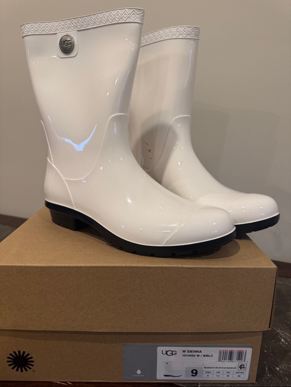 UGG White Glossy Mid-Calf Rain Boots with Black Lug Sole